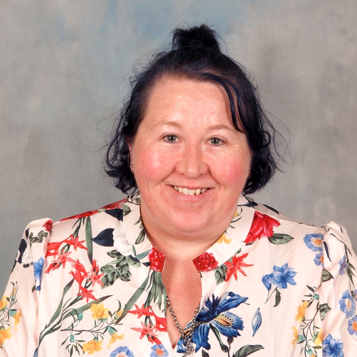 Portrait of Rebecca Healy, a staff member at Lifeline South East.